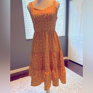 - Vintage 1950s inspired sleeveless tiered dress. NWOT adjustable straps.